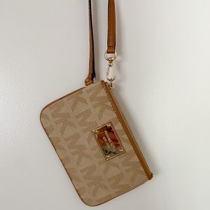 Michael Kors new condition tan wristlet